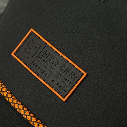 MTN OPS Base Cap (in the Black/Orange colorway)