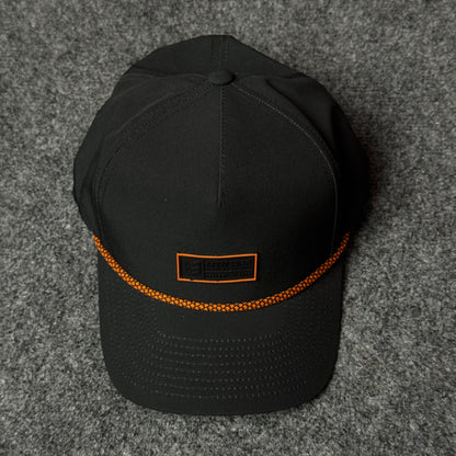 MTN OPS Base Cap (in the Black/Orange colorway)