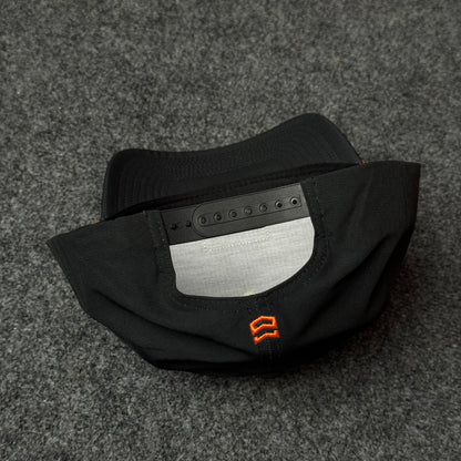 MTN OPS Base Cap (in the Black/Orange colorway)
